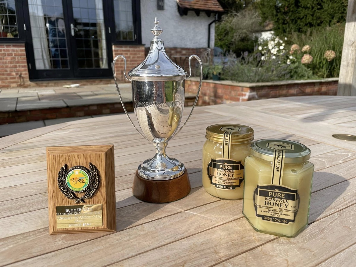 The Padmore Challenge Cup with winning Brundall Bee honey jars
